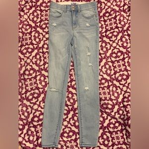 Light blue Skinny ripped jeans. Size 5 in juniors. Worn a couple of times.